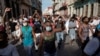 Manifestantes gritan consignas antigubernamentales durante la protesta del 11 de julio en La Habana. (REUTERS/Alexandre Meneghini).