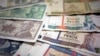 En Cuba circulan dos monedas desde 1993.(Archivo)