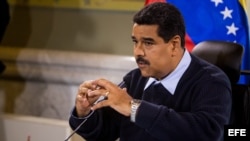 El presidente de Venezuela Nicolás Maduro habla durante una rueda de prensa el 24 de agosto del 2015, en el palacio de Miraflores en la ciudad de Caracas (Venezuela).